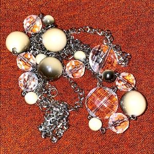 Triple strand silver and beaded necklace.